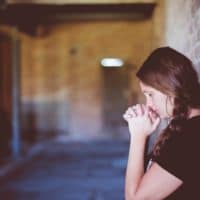 6 Ways To Break Down Spiritual Barriers The Navigators Woman Praying Against Brick Wall