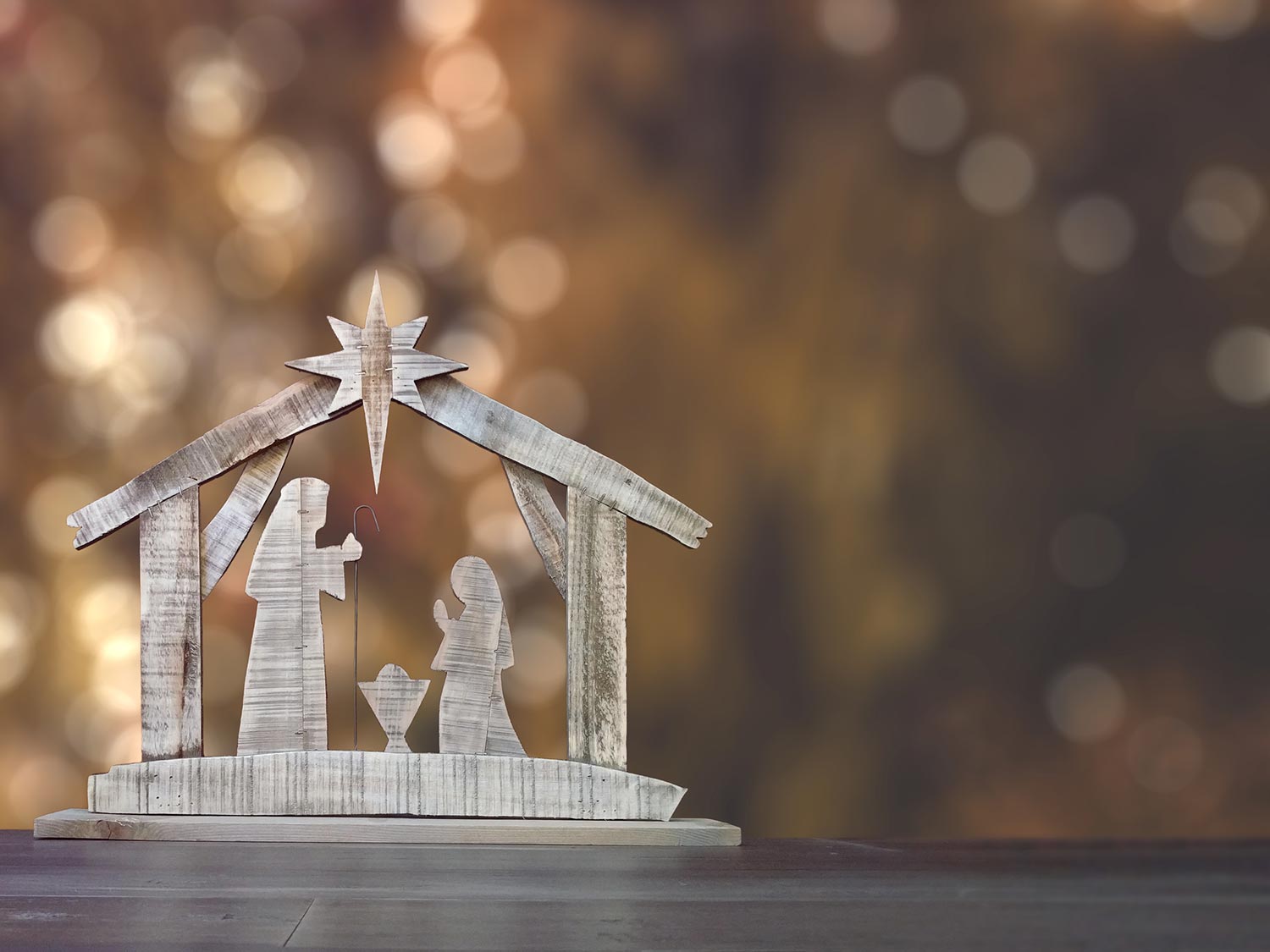 Prayers to Keep Christ in Christmas | The Navigators Prayer Resource | Ornamental nativity scene with Christmas tree background