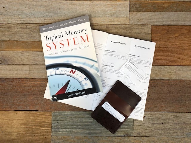 Topical Memory System (TMS) | The Navigators | Picture of the Topical Memory System (scripture memorization resource) on a wooden desk