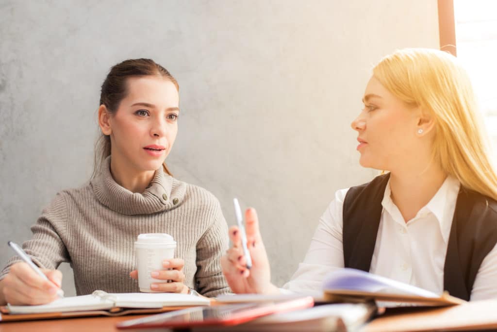 Bringing God Into Every Situation | The Navigators | Doug Neunke | two women sitting at a table having a discussion