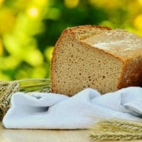 How to Begin Fasting | The Navigators Prayer Resource | baked bread on a wooden table outside