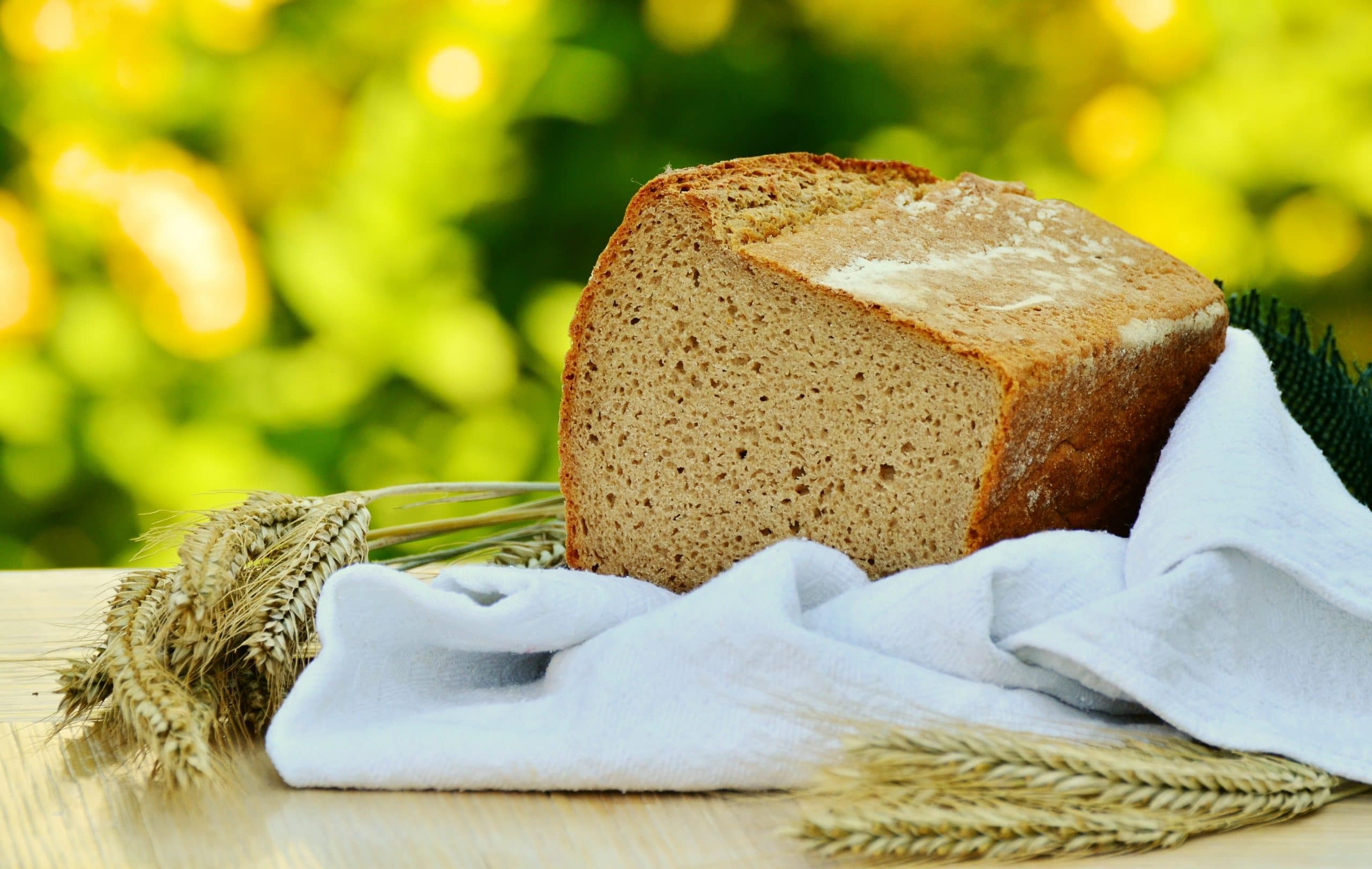 How to Begin Fasting | The Navigators Prayer Resource | baked bread on a wooden table outside