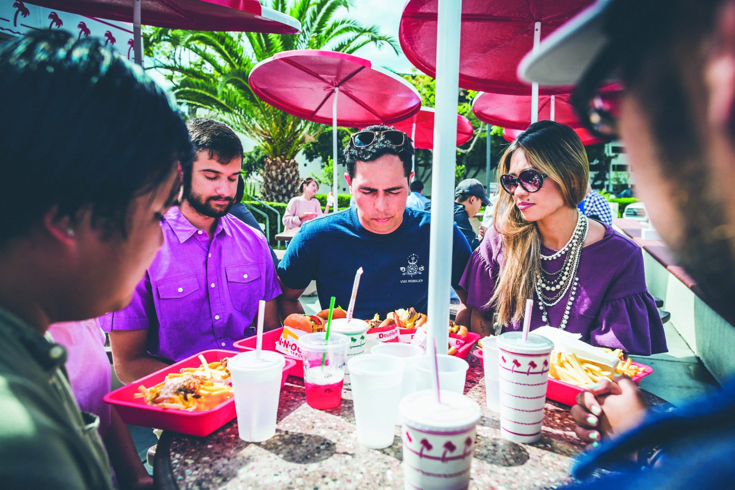 Reaching College Students | The Navigators Evangelism Stories | college students eating fast food outside at a covered table