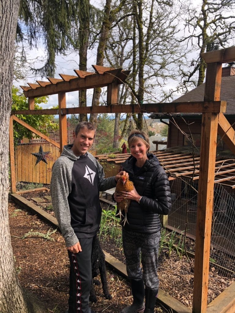 Loving Our Neighbors When We Are All At Home | Navigators Neighbors | John & Stephanie Winder posing with one of their chickens