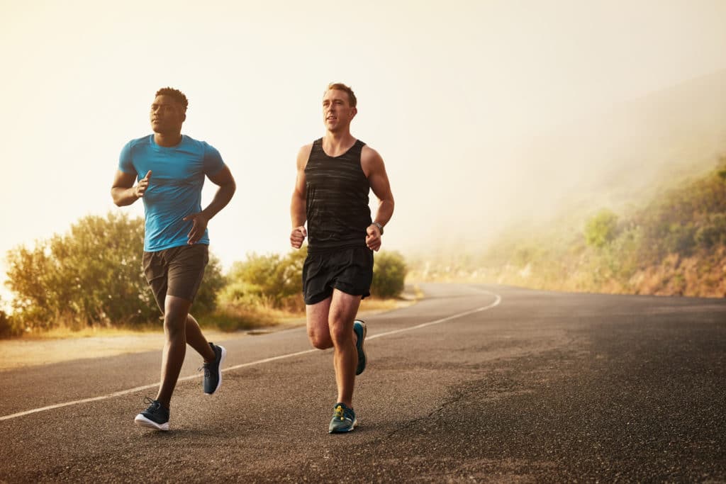 Seeking God in a Changing World | Shot of two young men out for a run together