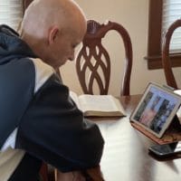 Intentional Discipleship Thrives Despite COVID-19 | Henry Bouma in prayer on a Zoom conference call