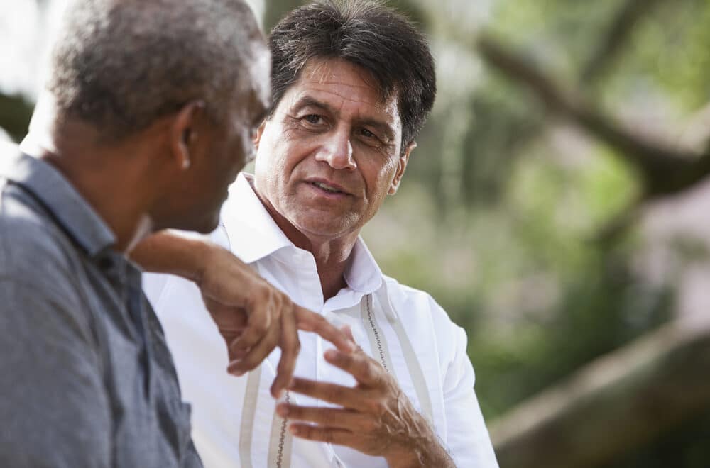 Spiritual Friendship | Navigators Discipleship Resource | Two men having a conversation outside