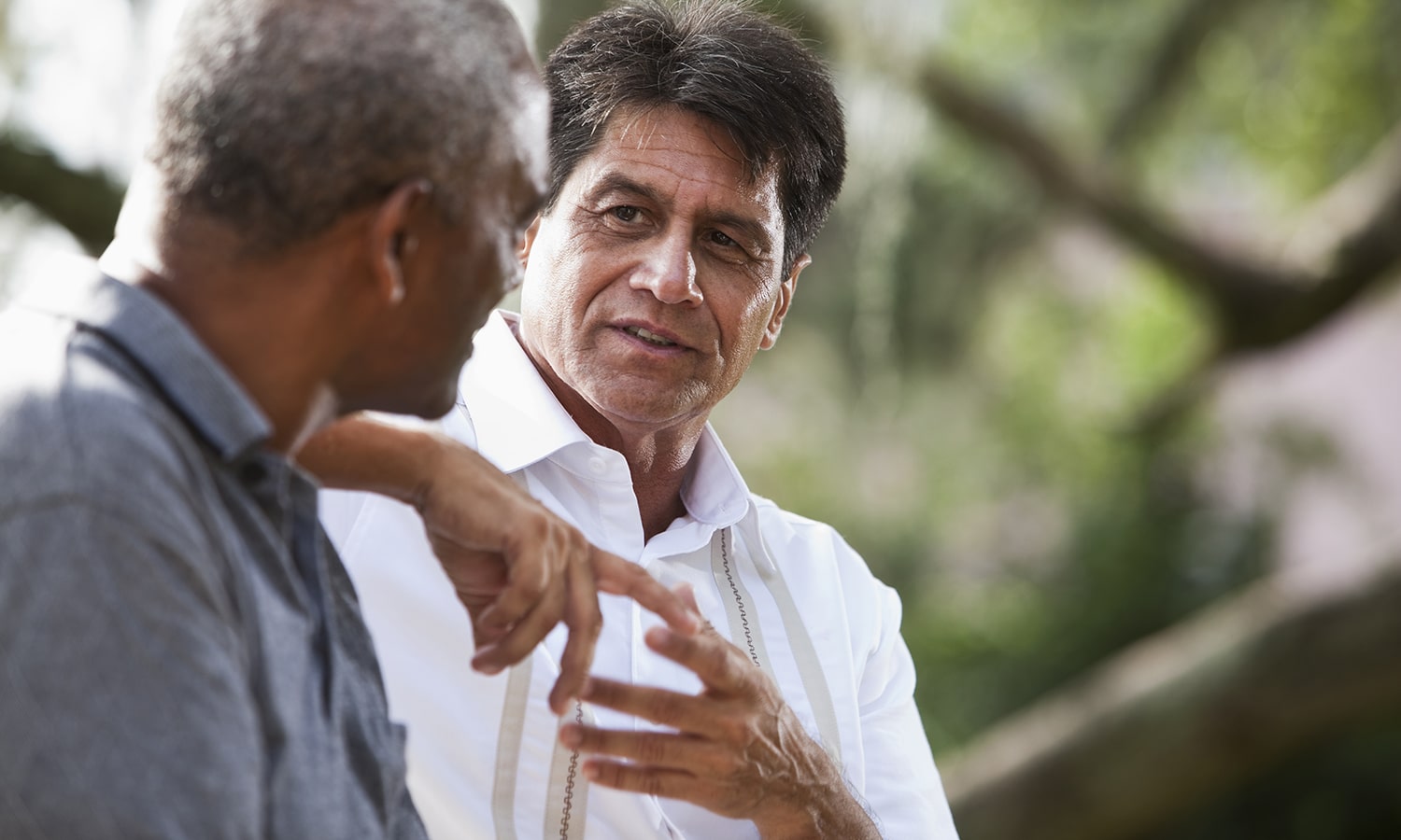 Spiritual Friendship | Navigators Discipleship Resource | Two men having a conversation outside