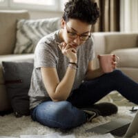 God’s Promises Combat Worry | Navigators Bible Study Resource | Young woman working at home