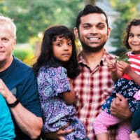 Discipling God’s Family | Navigators Neighbors | Left to right Susan and Paul Watson, Jibu and Priya Abraham and family