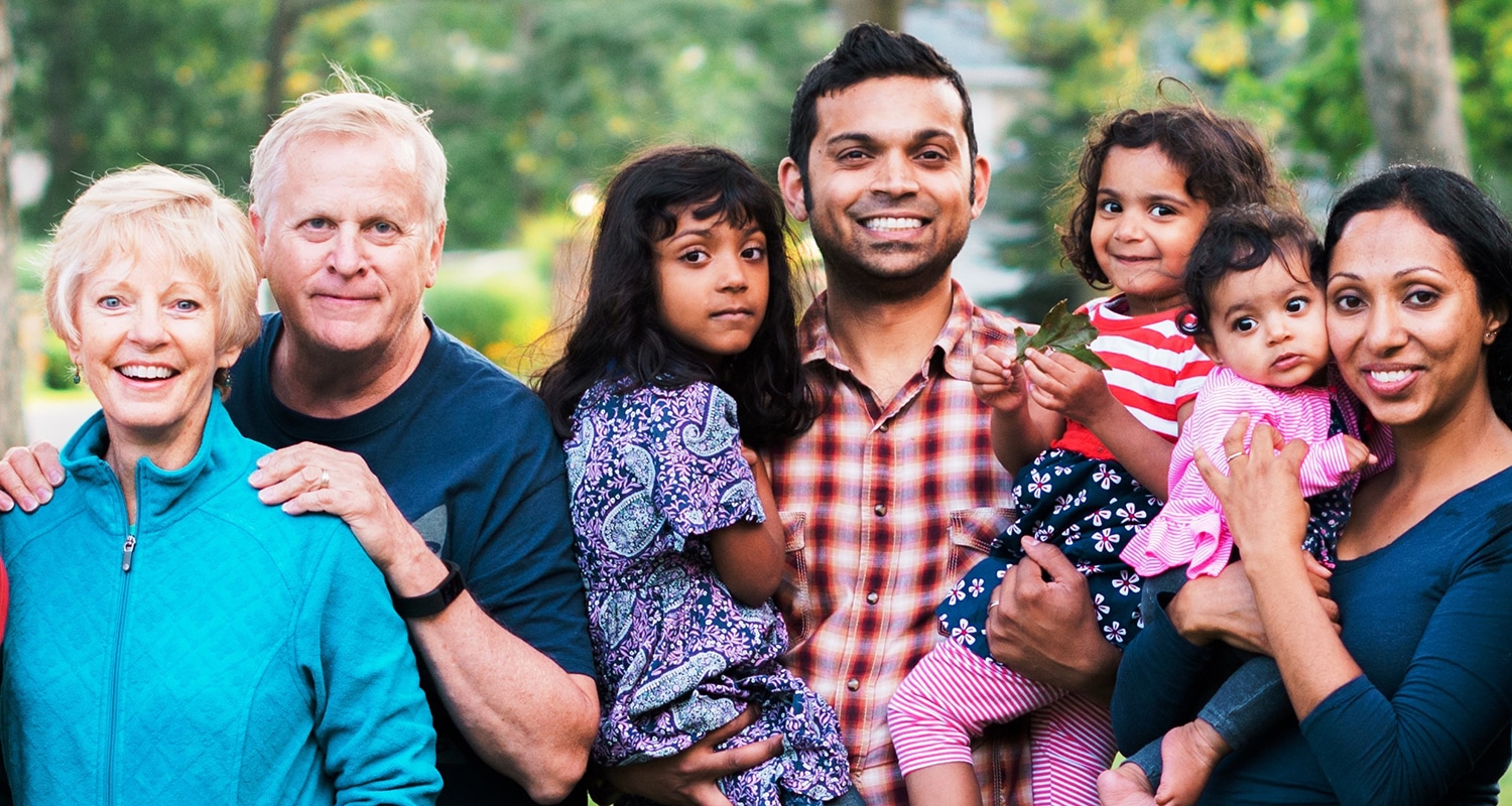 Discipling God’s Family | Navigators Neighbors | Left to right Susan and Paul Watson, Jibu and Priya Abraham and family