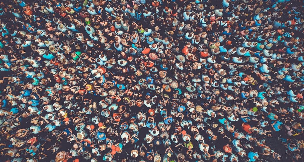 Multiples of One Million | Doug Nuenke | People crowd texture background. Bird eye view.