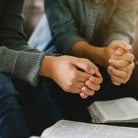 How to Pray | The Navigators | two women reading and study bible in home and pray together