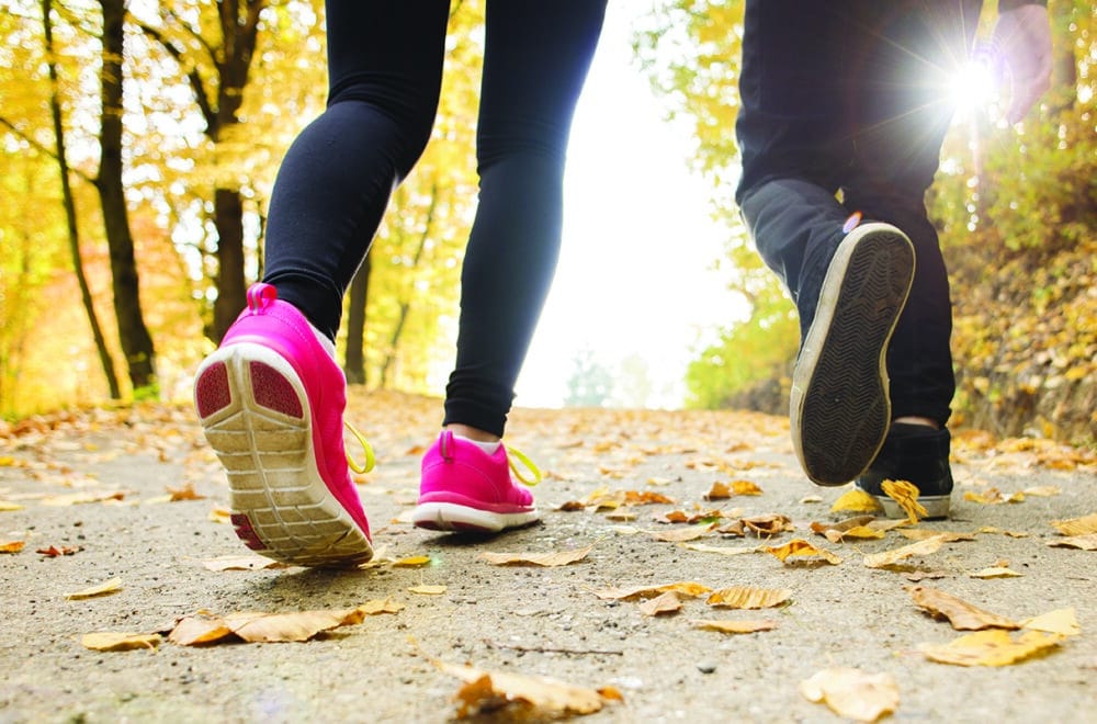 Simple Principles for Everyday Disciplemaking | The Navigators Churches | Feet walking on a path in Fall