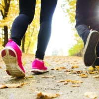 Simple Principles for Everyday Disciplemaking | The Navigators Churches | Feet walking on a path in Fall