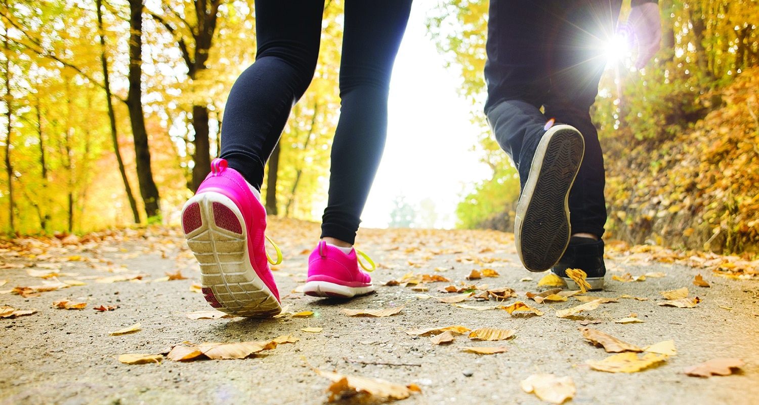 Simple Principles for Everyday Disciplemaking | The Navigators Churches | Feet walking on a path in Fall
