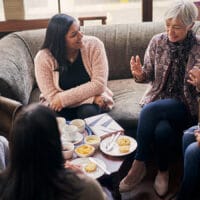 Equipping Women for Multiplication | The Navigators Disciplemaking for Life | Shot of a group of women attending a book club meeting at a bookstore