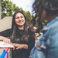 From Reading the Bible to Loving God’s Word | The Navigators Collegiate Ministry | Two women reading the bible together at college outside