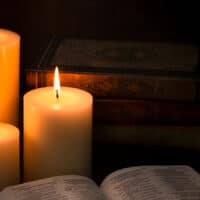 Joy in Christmas Comes from Jesus | Navigators Bible Study Resource | candles next to an open bible