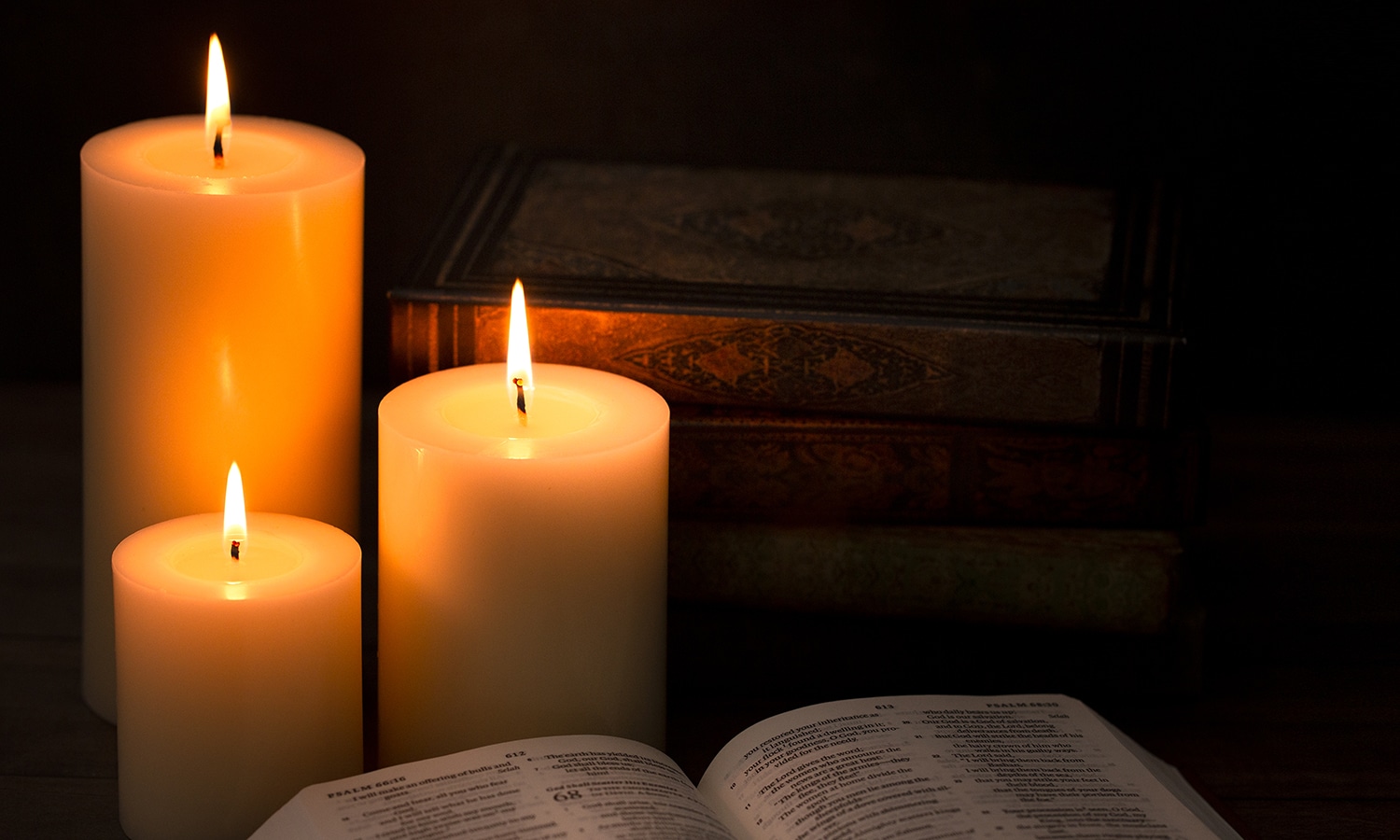 Joy in Christmas Comes from Jesus | Navigators Bible Study Resource | candles next to an open bible