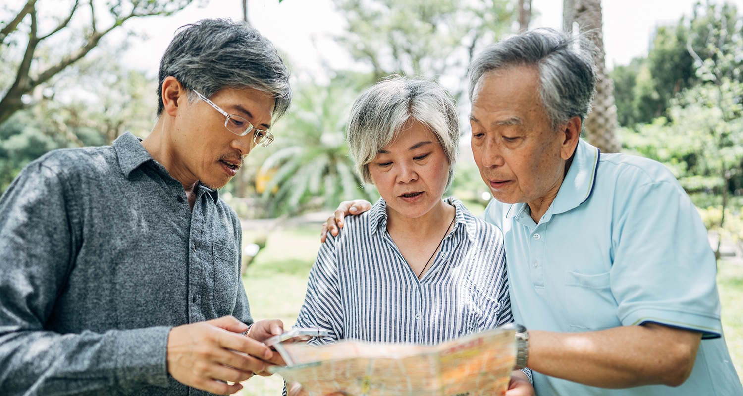 Faithful Foundation: Discipleship over the decades | Navigators Neighbors | Three senior friends looking at city map