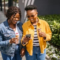 Two mothers walk together after a Christian parenting class.