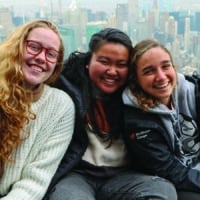 Three female Navigators smile as they reflect on how their faith grew though discipleship.