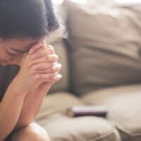 young woman praying