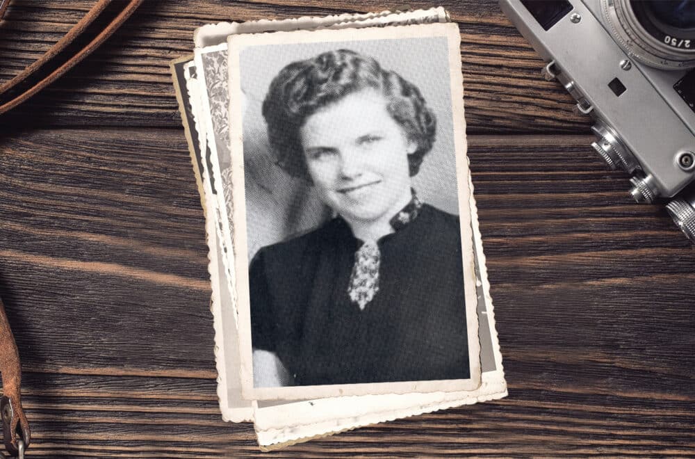 A black and white film photo of Kari Torjesen Malcolm, the first female navigator missionary.