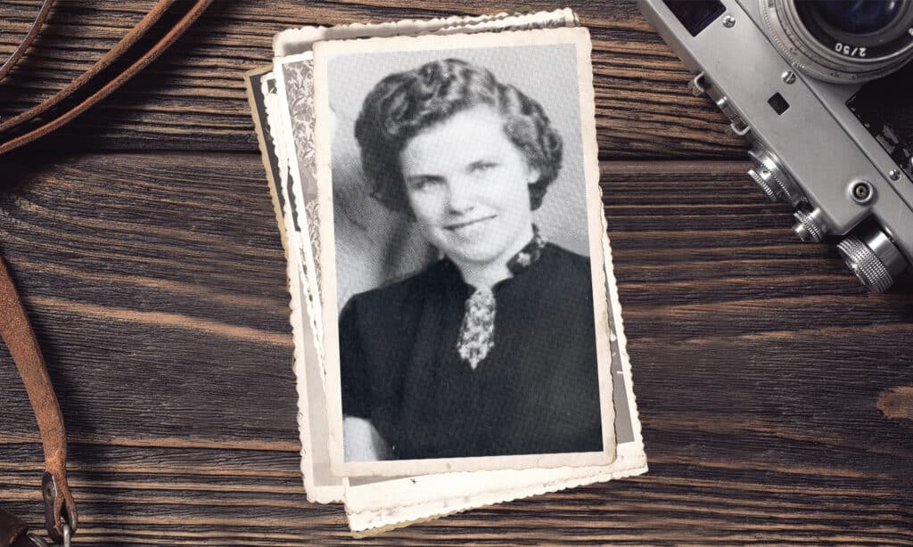 A black and white film photo of Kari Torjesen Malcolm, the first female navigator missionary.